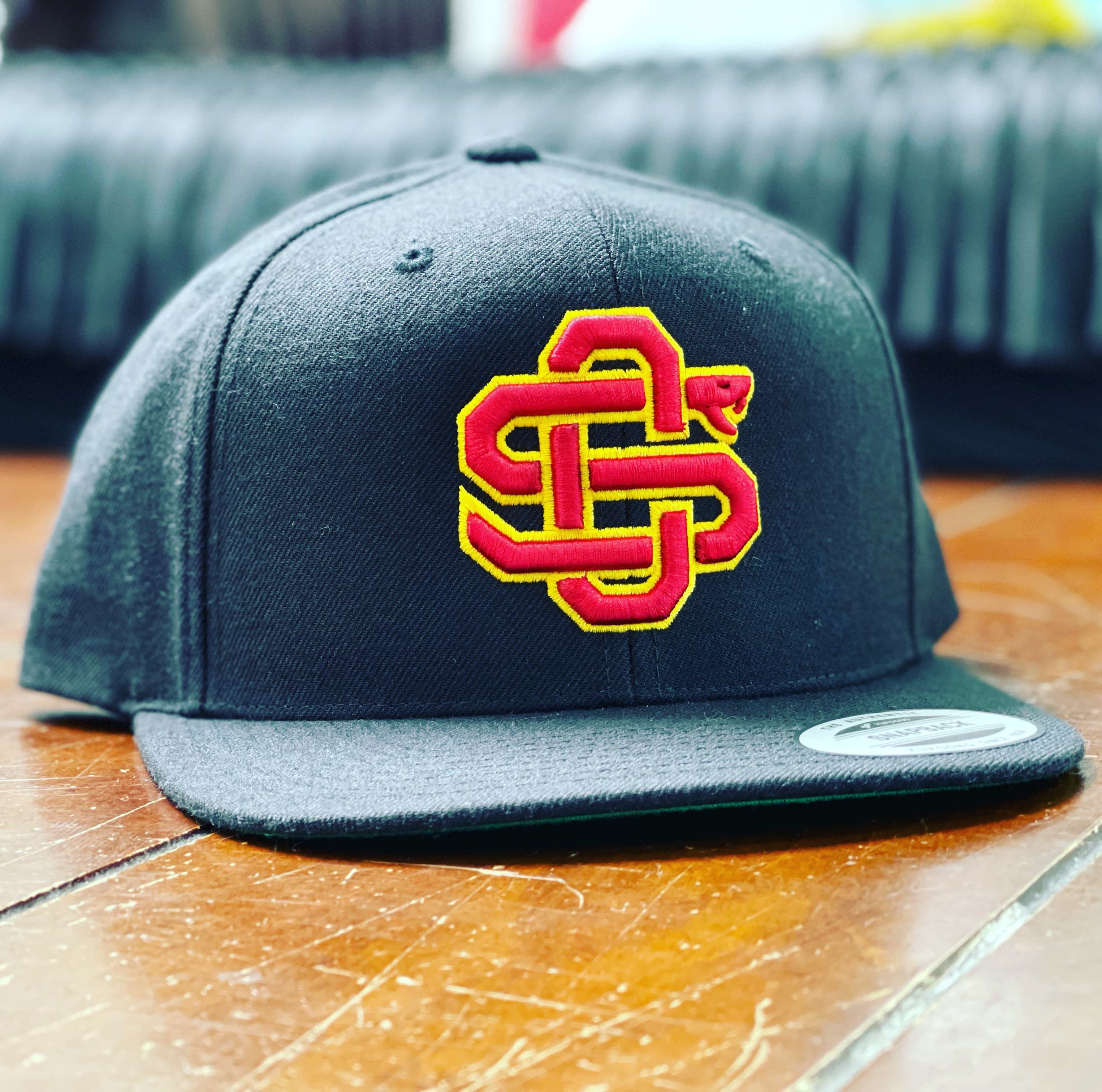 Custom embroidered hat produced by Precision Threads